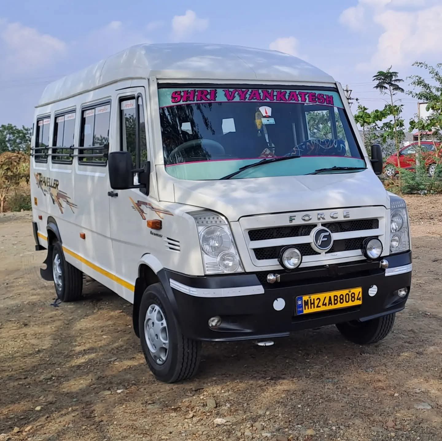 17 seater Force Traveller bus of Shri Vyankatesh Tours and Travels, front three-quarter exterior view
