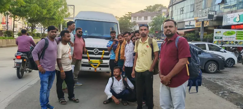 Customer group with tempo traveller on city street, Shri Vyankatesh Tours and Travels